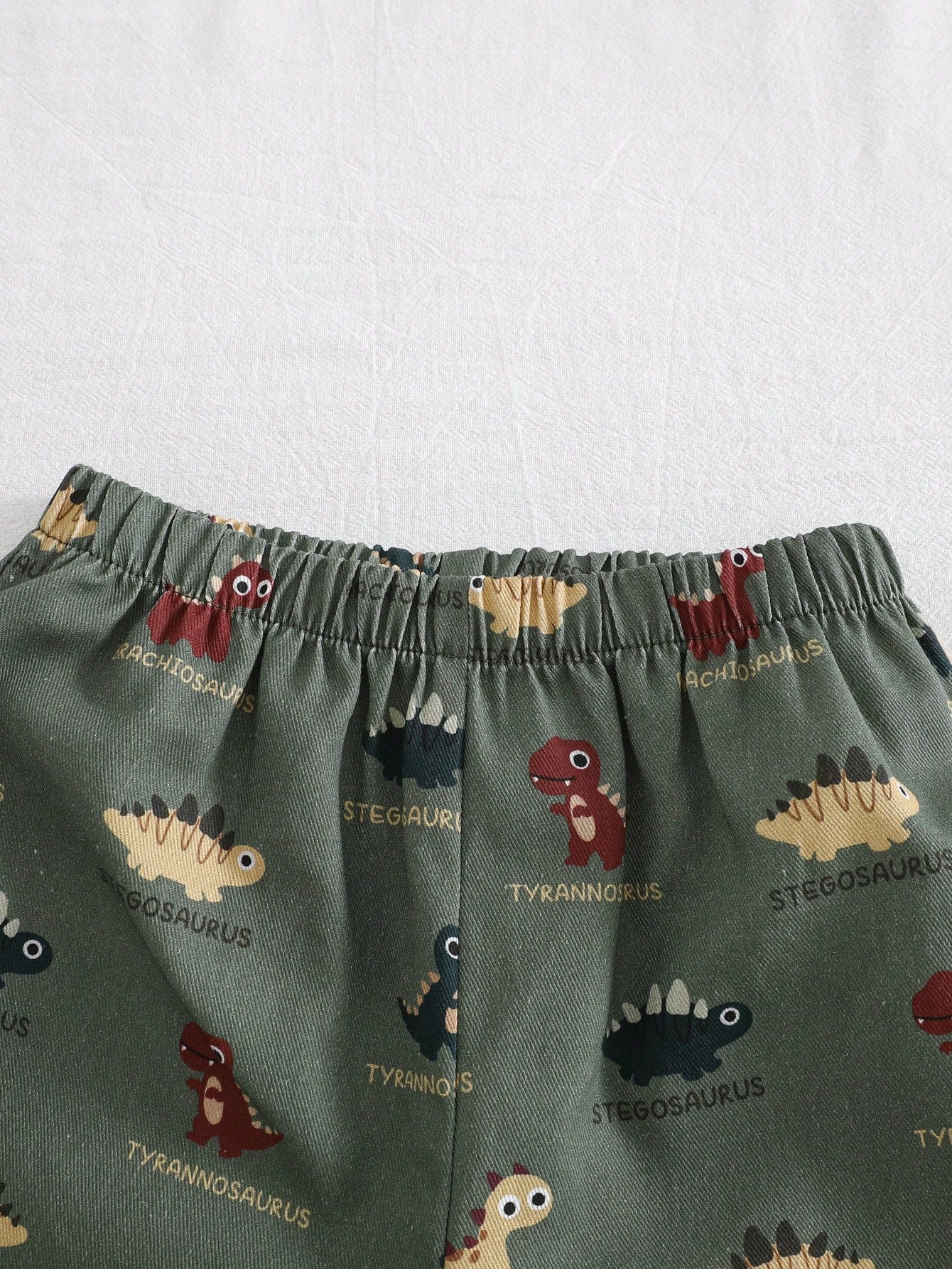 Conjunto 2 piezas de Top de manga corta de cuello redondo suave con estampado de dinosaurios de dibujos animados y pantalones cortos de cintura elástica