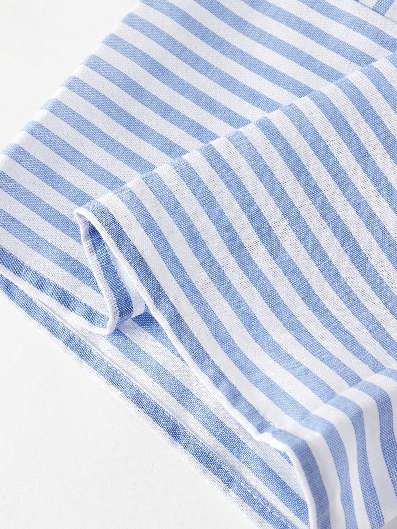 Conjunto camisola de rayas azules tejidas y pantalones de pierna ancha informal para vacaciones