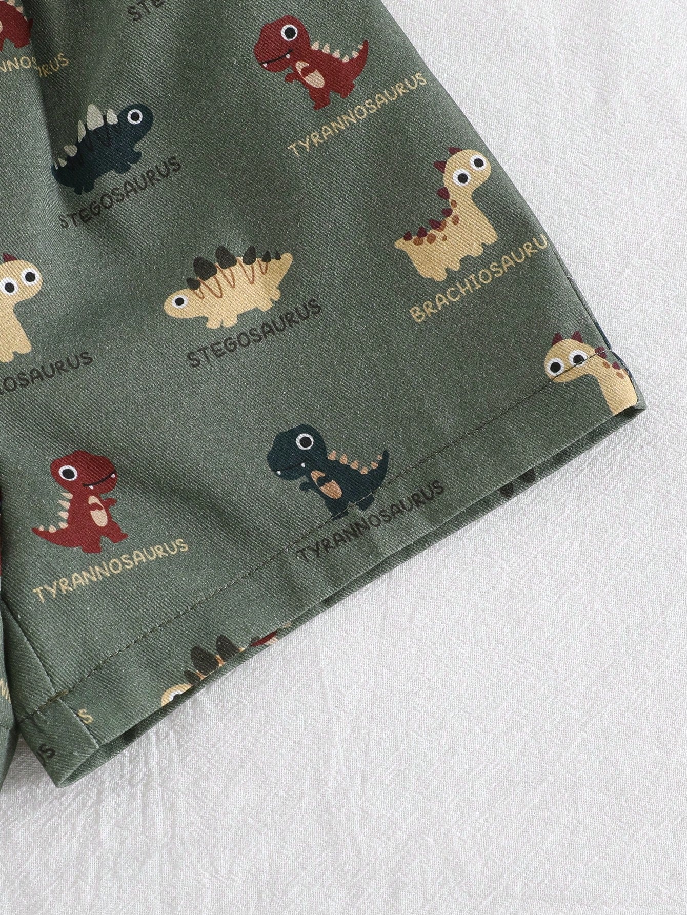 Conjunto 2 piezas de Top de manga corta de cuello redondo suave con estampado de dinosaurios de dibujos animados y pantalones cortos de cintura elástica